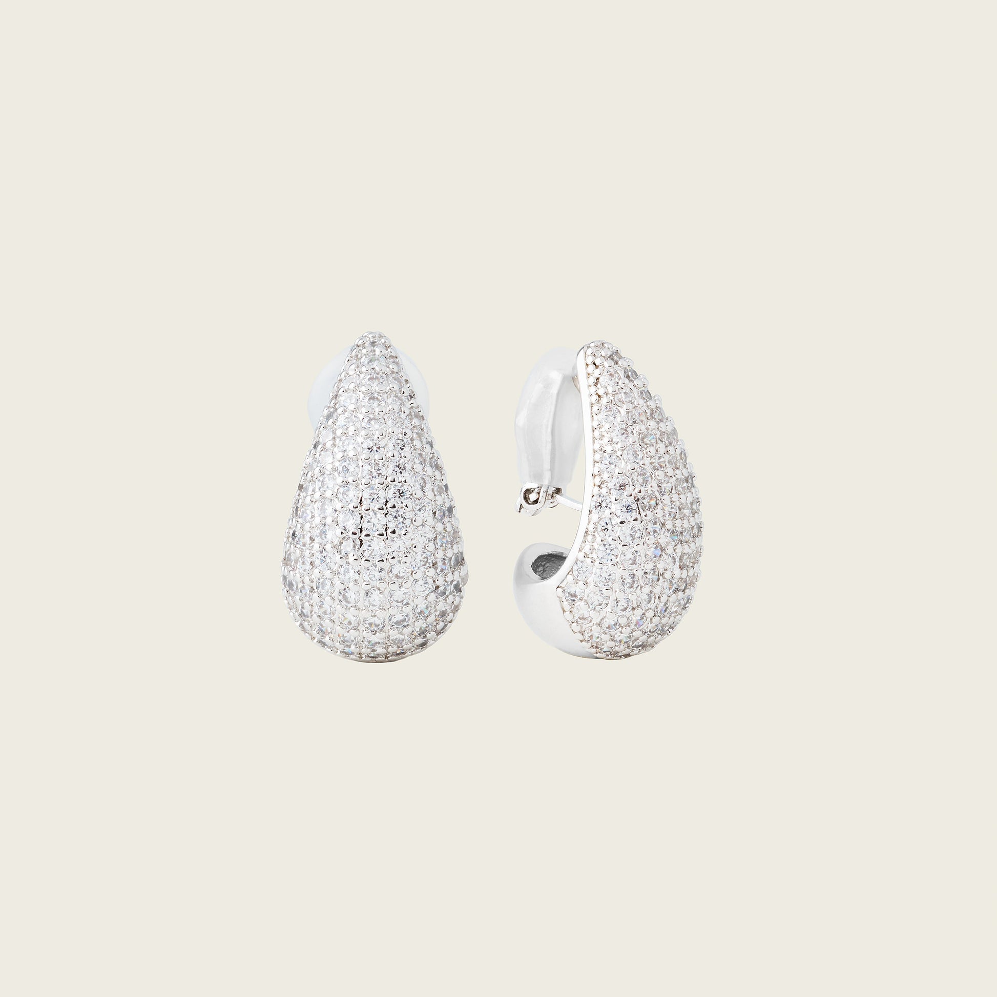 https://cdn.shopify.com/s/files/1/0569/3286/0096/files/AIORI_LilaPave_ClipOnEarring_Silver_1.jpg?v=1770215205