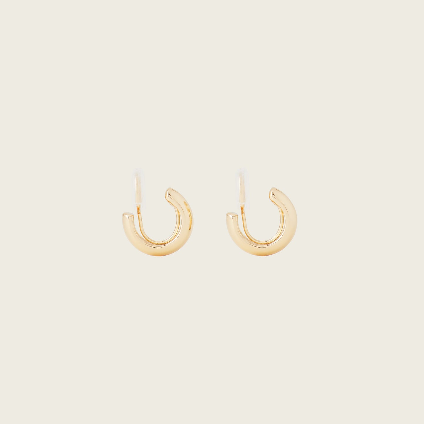 https://cdn.shopify.com/s/files/1/0569/3286/0096/files/AIORI_SimpleHuggie_Gold0_1_be934a45-e321-45d3-bf21-db81ba1b50ed.jpg?v=1762364090
