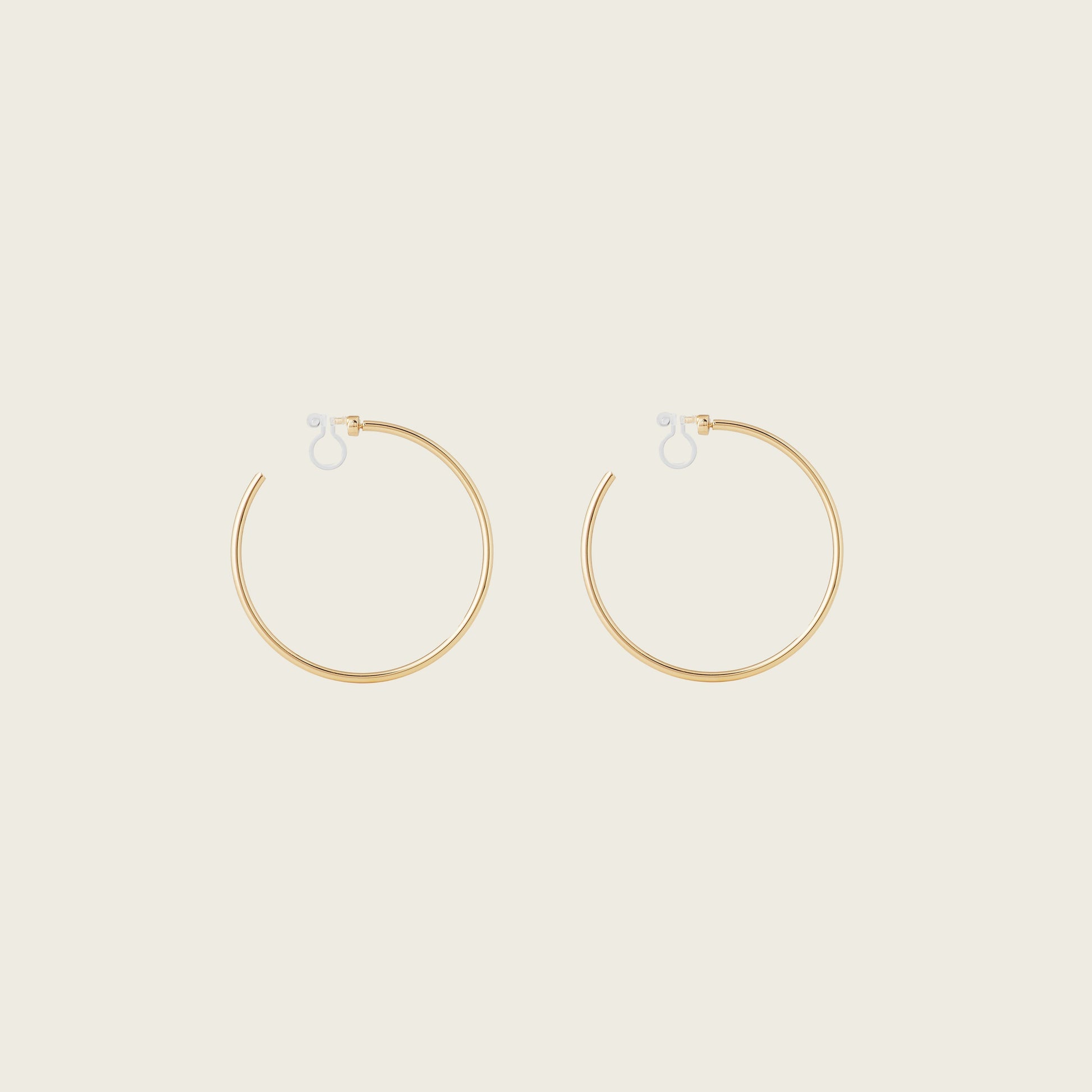 https://cdn.shopify.com/s/files/1/0569/3286/0096/files/LargeThinHoopinGold_c6c12797-aec5-47f2-9001-337b82298472.jpg?v=1754462432